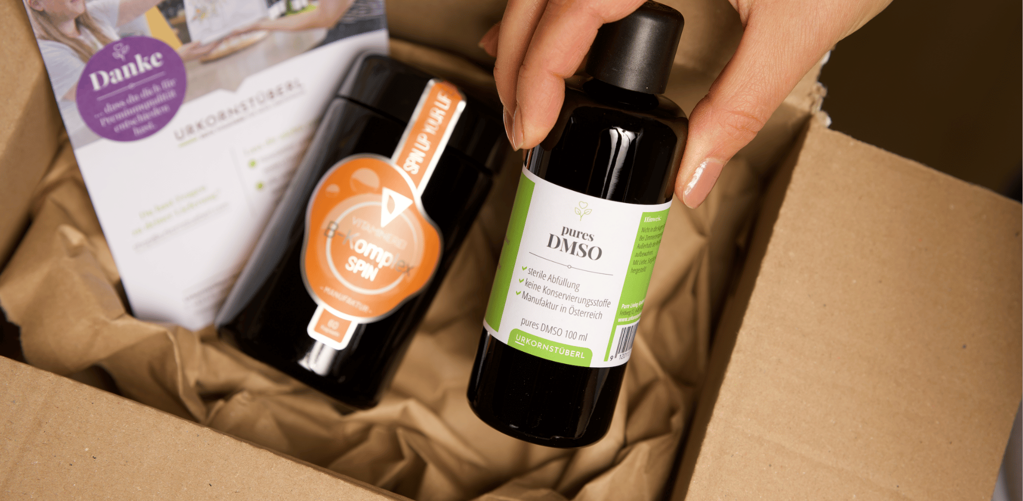 Paket vom Urkornstüberl mit DMSO und Vitaminereiprodukt